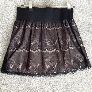 Black lace and nude skirt